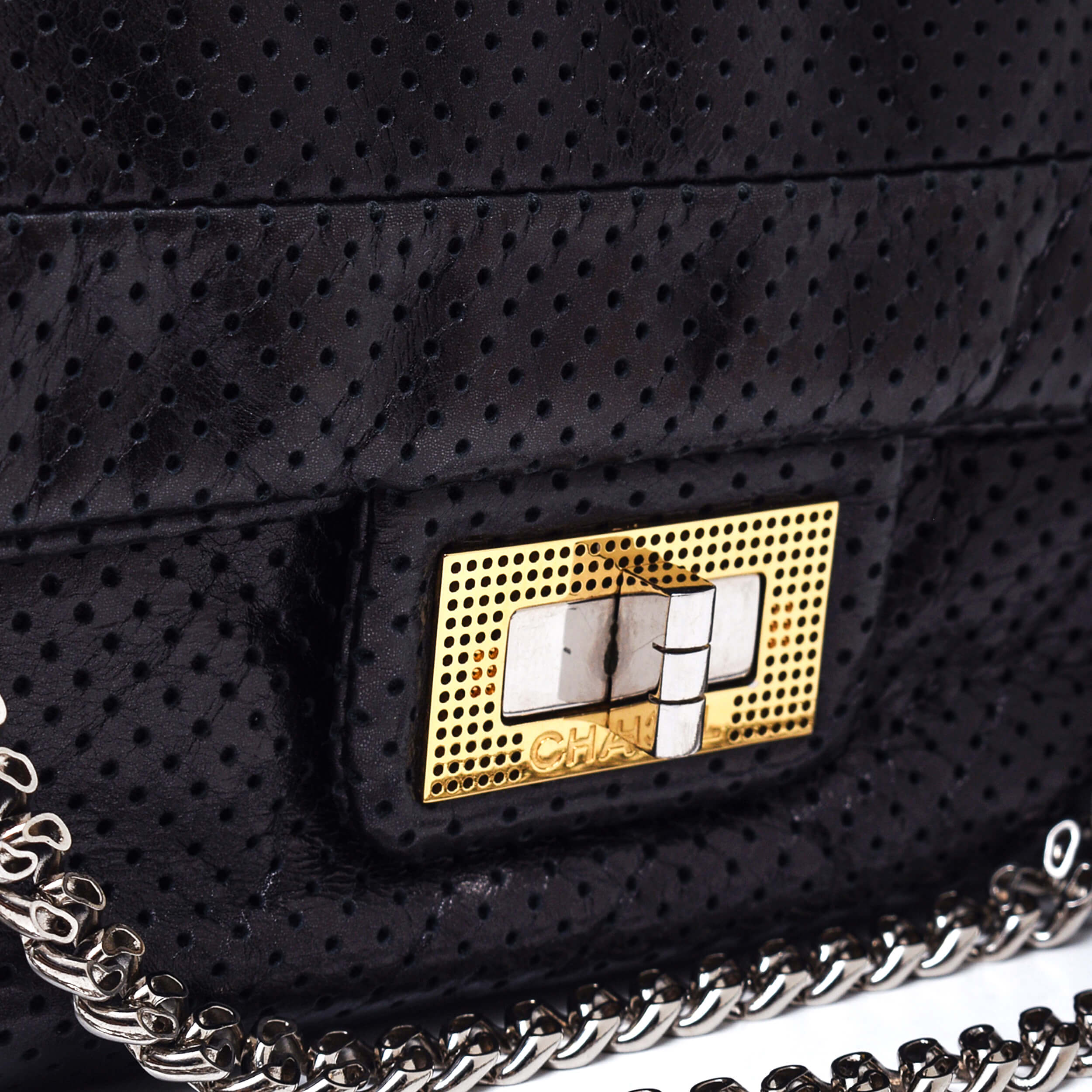 Chanel - Black Perforated Drill Leather Medium Classic Flap Bag